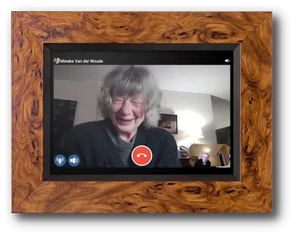 Memory Lane showing a video call with a cute old lady
